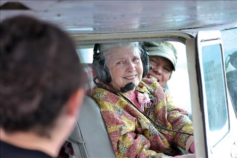 Lorene Pollock is all smiles after flying over MIssion Valley a day before her 79th birthday.