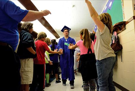 Mission seniors are congratulated by students in every grade level as they walk through the halls of their school.