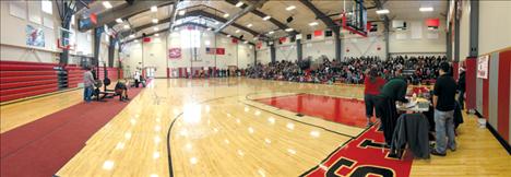 The Arlee High School gym is packed with spectators at a lift-a-thon held to raise money for the family of cancer patient and beloved community member Joe Pablo last Thursday.