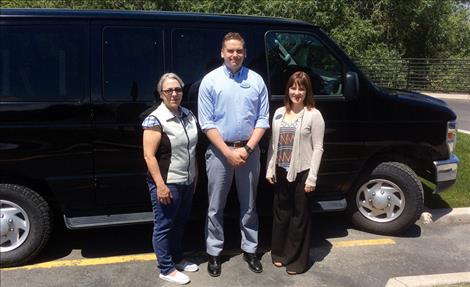 Employees of Glacier Bank in Polson, above, and Whitefish Credit Union, below, stand in front of the new van.