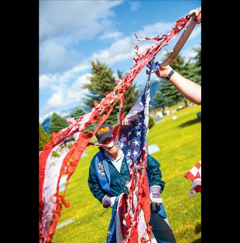  A tattered flag is retired.