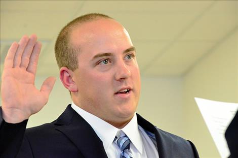 Corey White is sworn in as a Ronan Police Officer.