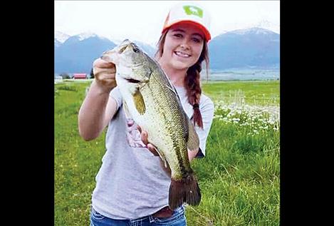 She loved fishing, so much so that she waited 45 minutes to catch the big one, top right, according to her brother.