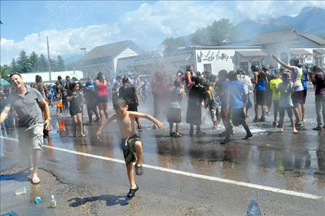 The Good Old Days parade typically ends with a splash.