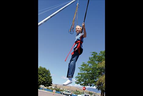 Bungee jumping very popular at 2016 Cherry Festival.