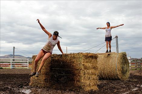 Ashley Mercer and Keri Allison plow through the course with determination, above, and celebrate at the finish line, bottom right. 