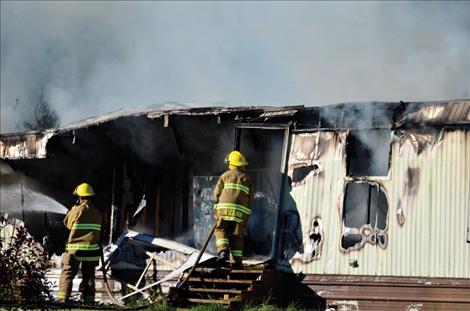 A trailer home in St. Ignatius burns Wednesday morning, July 20.