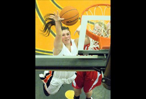 Raymi Clairmont goes up for two during the Maidens’ Dec. 18 game against the Loyola Sacred Heart Breakers. Ronan won, 39-34. 