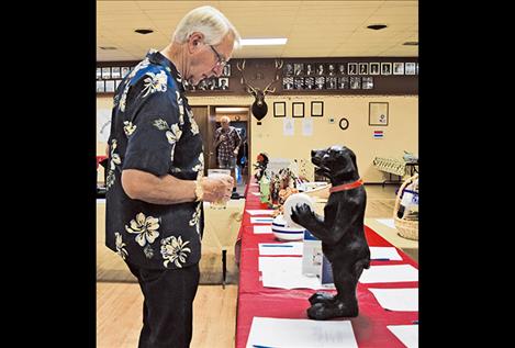 Various auction items are displayed for the public to bid on.