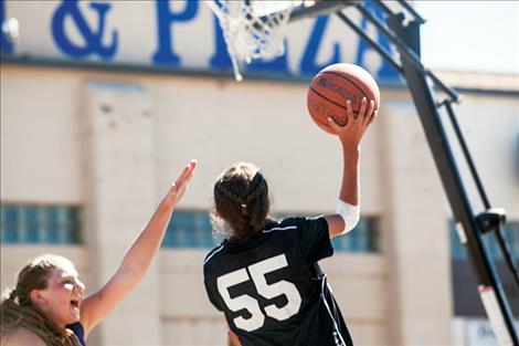 Madyson Currie goes up for the layup.