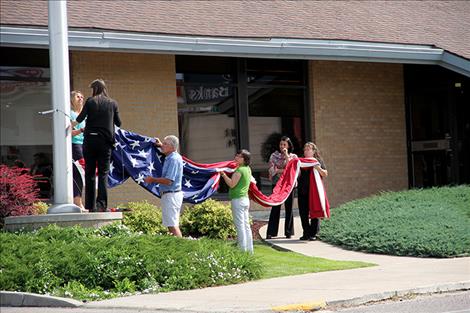 Valley Bank raised the American flag Aug. ,