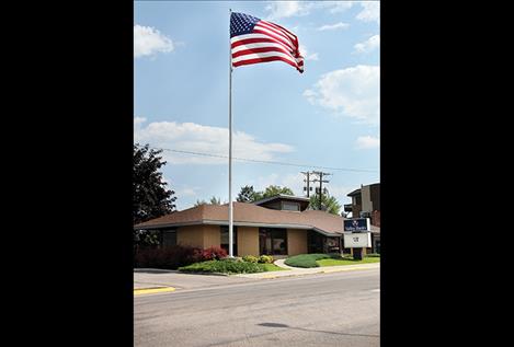 The American flag,the same large symbol that Glacier Bank flew when they occupied the building.