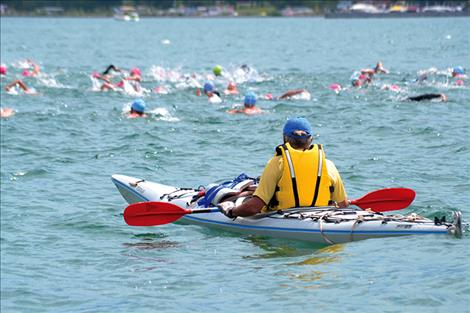 Connie Plaissay watches from a kayak.