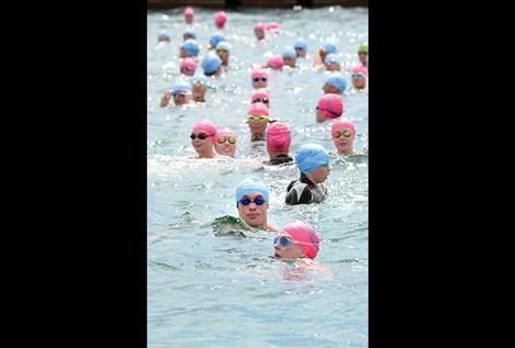 Swimmers of all ages prepare for the start of Saturday’s 14th annual Water Daze 1-mile swim across Polson Bay.