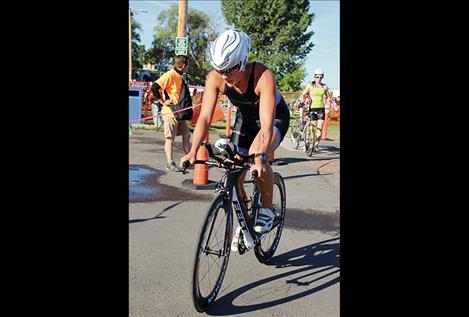 Competitor Amanda Hunter rides her bike in Saturday’s triathlon.