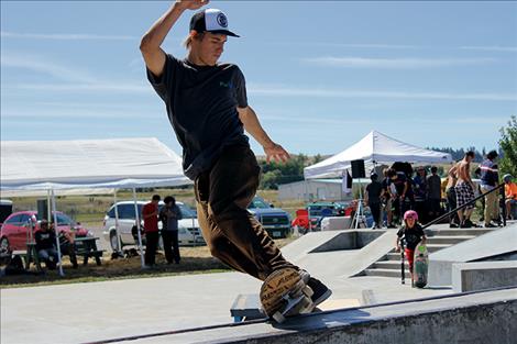 Skateboarders perform tricks during the Skate Jam competition to help raise money for park expansion.