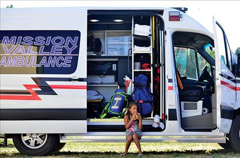 Fundraiser participants check out the new ambulance.