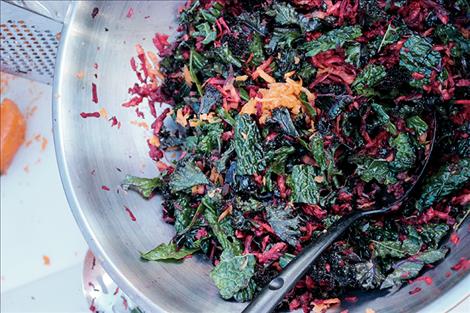 Kids made Power Kale Salad with kale, carrots, beets, sunflower seeds and dressing.