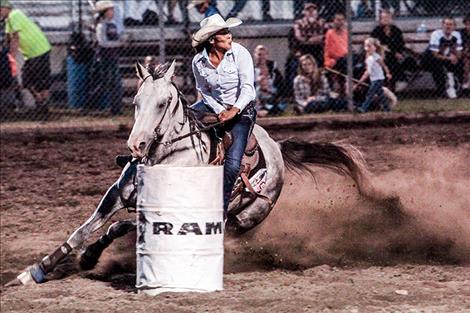 Mikaela Gonzales competes in barrel racing