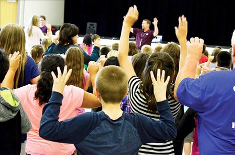 Principal Tyler Arlint demonstrates how to dance like a duck during the first week of school.