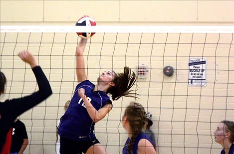 Cheyenne Nagy goes up for the kill in Drummond.