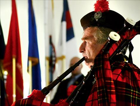 Rod Douglas of the Montana Highlanders opens the ceremony with patrioric tunes.