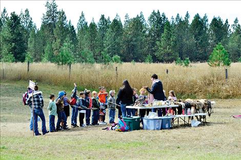 CSKT Biologists asks students questions about nature.