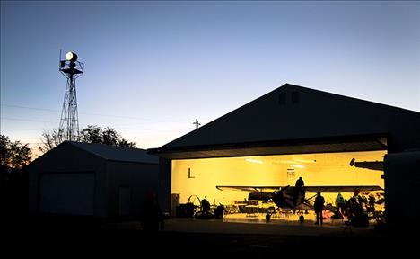 PILOTS PREPARE BEFORE DAWN