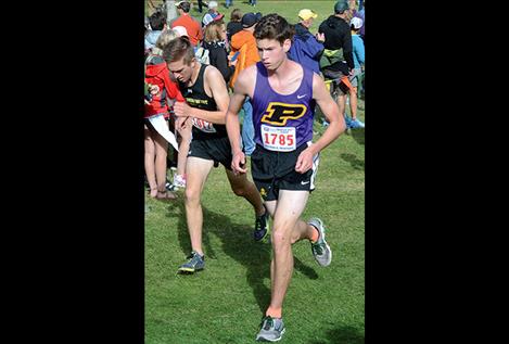 Polson’s Matt Sitter (in Missoula, above) ran a sub-18- minute mile Saturday in Whitefish.