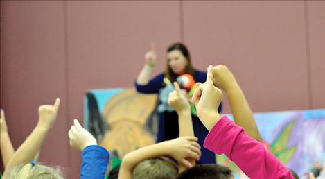 Students pinky promise to follow their hearts.