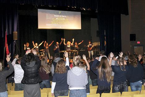 New Life Church leads the crowd in worship and prayer.