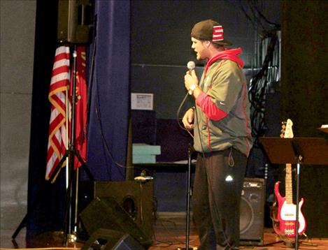 Guest athlete Tim Rausch, a baseball player at Western Oregon, speaks at Wednesday’s Fields of Faith event.