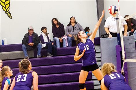 Cheyenne Nagy, Charlo Lady Vikings, extends for a point.