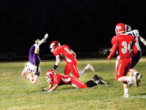 Viking Jared Doty dives with the ball during the game against the Warriors