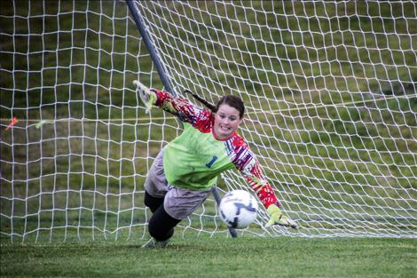 Lady Pirate goalie Jenna Evertz blocks a kick in the shootout.