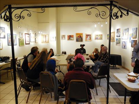 People gather at Hangin Art Gallery in Arlee Oct. 19 for the Green Party event.