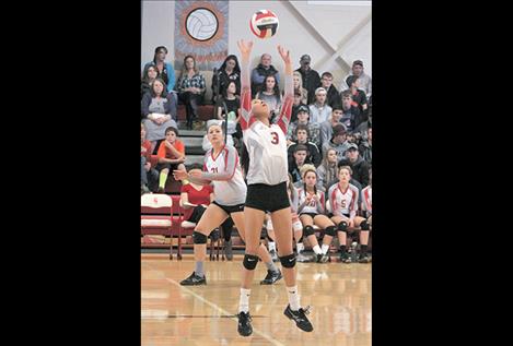  Mikayla Rieken works through set after set to earn first place in the 14C district tourney.