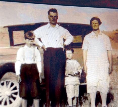A vintage photo of Morris, left, and Orville, in the middle, with their parents Martin and Clara Bjorge is one of the highlights of the slide show at Orville’s 90th birthday.