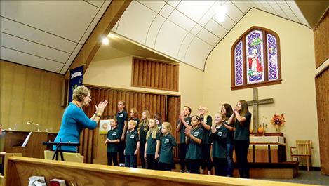 Mission Valley Children’s Choir sings with direction from Cathy Gillhouse.