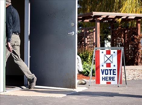 A sign indicates a voting location.