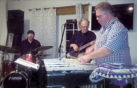 Grant Sorlie, right, and Good Vibes play at the Symes Hotel in Hot Springs on Friday night. Sorlie is pictured on right playing the vibraphone. Pictured with Sorlie are Neil Batterson on drums and Jim Luikens on bass guitar.