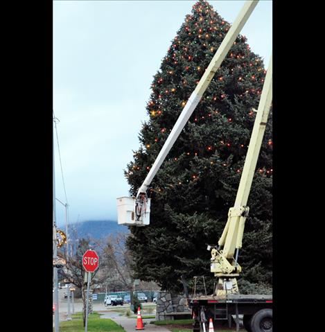 The Ronan Christmas Tree gets decorated on Friday.