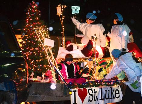 St. Luke Community Healthcare employees care for an “injured” Santa.