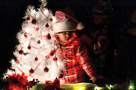White Christmas trees, bright lights and bundled kids decorated many of the parade’s 53 entries.