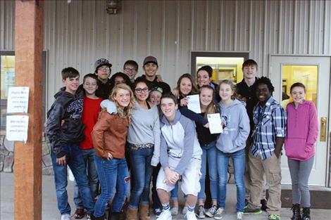 Students at Polson Middle School deliver more than 2,500 non-perishable items to Polson Loaves and Fish food panty.