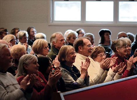 Audience members applaud performances Sunday at Good Shepherd Lutheran Church.