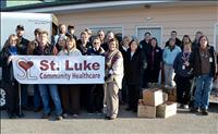 St. Luke employees collect items for food pantries
