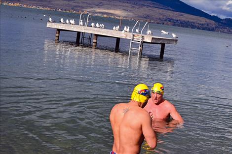 Mark Johnston of Polson and Ramon Mercado of Missoula enter Flathead Lake in late November.