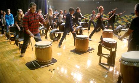 Members of Fubuki Daiko Japanese drumming group practice before their October perfomance at Polson High School.