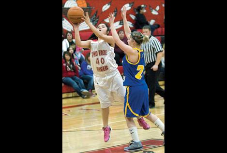 Misty Mendoza shoots a jumper during the Lady Eagle’s game against Victor Friday night.